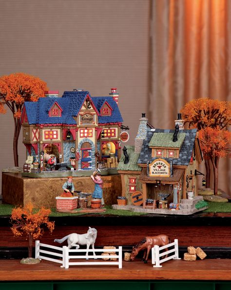 Decorating for Thanksgiving should be easy.  You just finished Halloween and Christmas is right around the corner.  Here is a simple but festive example of a Thanksgiving table display with two Lemax houses and few accessories. Thanksgiving Village Display, Thanksgiving Village, Fall Village, Decorating For Thanksgiving, Holiday Village Display, Halloween Villages, Autumn Village, Thanksgiving Planning, Sunday School Projects