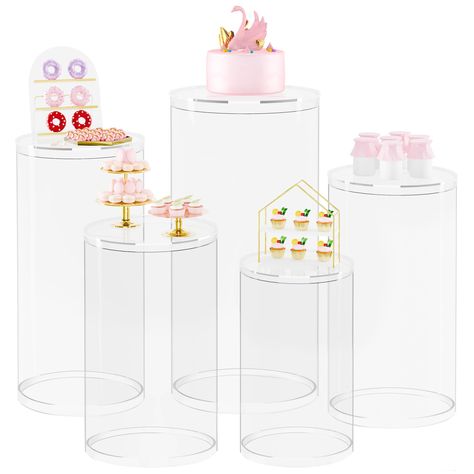 PRICES MAY VARY. EASY ASSEMBLY & STORAGE -The hollow structure of the round cylinder stands ensures easy setup, and they can be effortlessly overlapped for space-saving storage. The lightweight design, removable lids, and stackable features make these pedestals convenient to transport and store when not in use. DURABILITY PREMIUM QUALITY -Crafted from premium PVC material with meticulous baking paint craftsmanship, these cylinder pedestal stands provide a stable and durable display platform, ens Birthday Event Decor, Dessert Table Display, Cylinder Pedestal, Display Pedestal, Pedestal Stand, Kinds Of Desserts, Birthday Event, Acrylic Ring, Pedestal Cake Stand