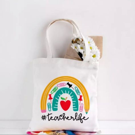 #Teacherlife Tote Bag Is The Perfect Gift For That Special Teacher In Your Life. Super Cute Canvas Tote Bag Will Help Her Carry Her Stuff And Be Stylish Every Day. Ideal For Staff Meetings, Field Trips, Shopping Or A Normal School Day. Surprise Her On Teacher’s Appreciation Week And Show Her Your Gratitude And Love For All That She Does For Our Children. Product Size: 35x40cm ; 13.78x15.75in Staff Meeting, Normal School, Note Pad Design, Surprise Her, Staff Meetings, Teacher Tote, Cute Canvas, Favorite Teacher, Busy Lifestyle