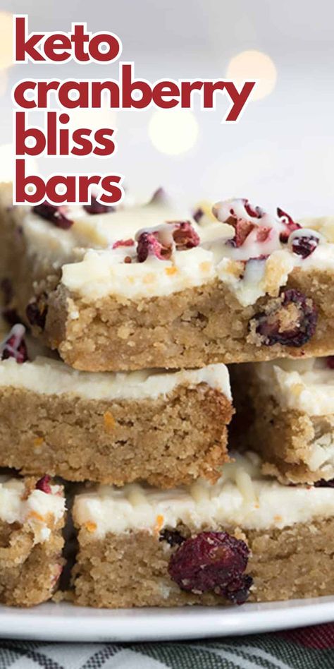 Pure holiday magic! These keto Cranberry Bliss Bars feature a tender low carb cookie bar topped with sugar-free cream cheese frosting and studded with dried cranberries and keto white chocolate chips. It's better than Starbucks! #starbucks #cranberryblissbars #ketobaking #sugarfree #ketoholidays Keto Cranberry Recipes, Cranberry Bliss Bars Recipe, Keto Cranberry, Cranberry Bliss Bars Starbucks, Low Carb Bars, Bliss Bars, Cranberry Bliss, Bliss Bar, Cranberry Bars