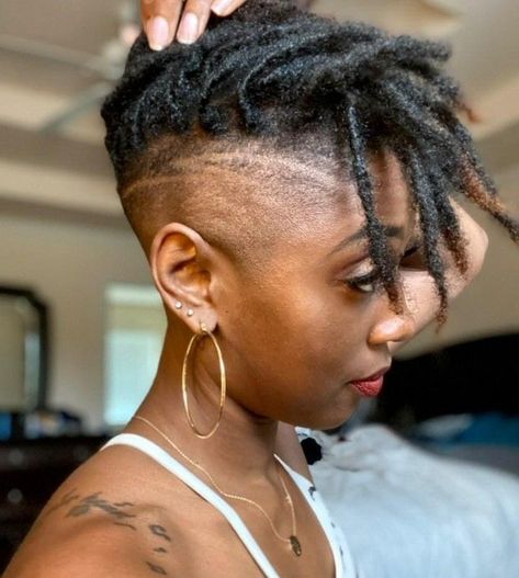 Dreads With Taper Fade Women, Mohawk Locks Women, Locs And Shaved Sides Black Women, Locs Hairstyles For Women With Shaved Sides, Short Locs With Undercut Women, Tapered Locs Shaved Sides, Dreds Locs Black Women Styles Short, Black Woman Shaved Sides, Shaved Side With Locs