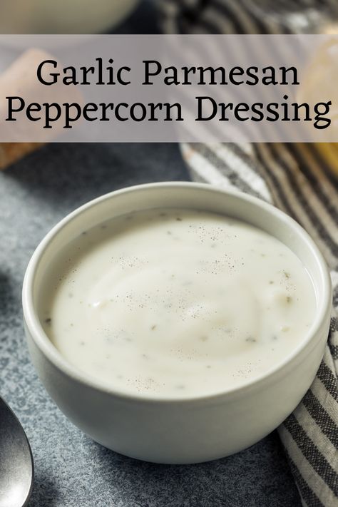 This creamy homemade dressing offers a kick from freshly cracked black pepper, savory garlic, delicious Parmesan cheese, and a slight zing of lemon. Parmesan Peppercorn Dressing, Peppercorn Dressing, Raw Veggies, Leafy Salad, Peppercorn Sauce, Dressing Recipes, Homemade Dressing, Cracked Pepper, Garlic Parmesan