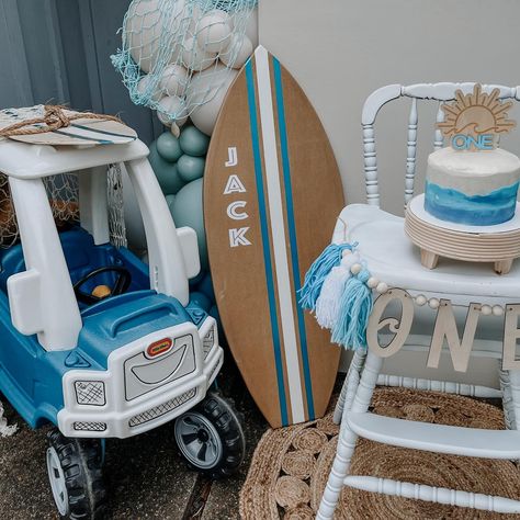 The Big One 1st Birthday party today 🌊🏄🏼‍♂️🌞✨ Smash cake and cookies by Bake Someone Happy. 😋 Little Tikes car makeover and custom surfboards by my brother and Krupted Rides 🏄🏼‍♂️😎✨ The Big One Surf Birthday Centerpieces, Tikes Car Makeover, Little Tikes Car Makeover, The Big One Birthday Party, The Big One Surf Birthday, Beach Bday, Car Makeover, Surf Birthday, First Birthday Party Favor