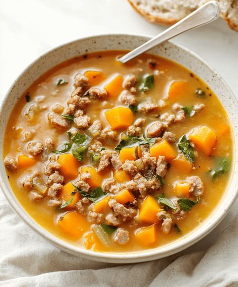 Hearty sausage and sweet potato soup, perfect for a cozy meal. Easy recipe with rich flavors and nutritious ingredients. Sweet Potato Sausage Soup, Soups With Sweet Potatoes, Sausage And Sweet Potato Recipes, Soup Recipes Sweet Potato, Sausage Sweet Potato Soup, Sausage And Sweet Potato Soup, Sausage Sweet Potato Recipes, Sausage And Sweet Potato, Sweet Potato Soup Recipes