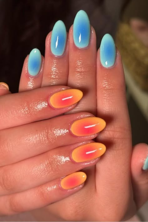 You can mix colors in various ways to spice up your aura nails, from different colors on each nail to high contrast blends. For example, this combo of cool icy blue on one hand and warm orange on the other with an eye-catching fire and ice effect.//photocredit:@kyliesbeautycorner Neon Nail Designs, Aura Nails, Neon Nails, Aura, Nail Designs, Design Ideas, Nails, Celebrities, Design