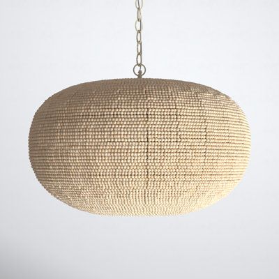 Adorned with hundreds of hand-carved mango wood beads, each with its own character, this oversized pendant will embellish any room with eye-catching texture. Whether it recalls summer at the seaside or bohemian chich, the substantial scale makes it an ornamet for any room. | Birch Lane™ Karlene Wood Bead Dome Pendant Wood / Bamboo in Brown | 19 H x 32 W x 32 D in | Wayfair Tavern Lighting, Coastal Bungalow, Oversized Pendant Light, Salon Lighting, Dining Room Light Fixture, Beach Place, Beachy Style, River Park, Cozy Reading Nook