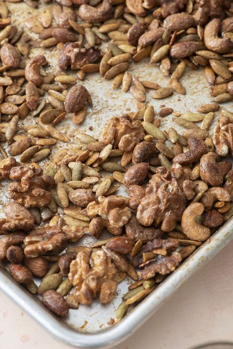 Pumpkin Spice Mixed Nuts and Seeds | Weelicious Roasted Nuts Recipe, Spiced Nuts Recipe, Edible Holiday Gifts, Raw Nuts, Organic Maple Syrup, Pumpkin Spice Syrup, Nut Recipes, Roasted Nuts, Nuts And Seeds