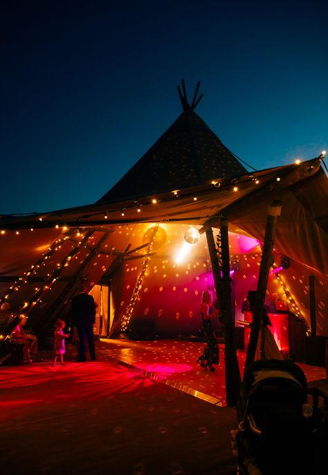 Tipi Party!   Photo Credit: @Emily Little Photography  #tipishowcase #weddingshowcase #weddinginspiration #bohowedding #tipilighting #wedding #gianttipi #festivaltipi #venue #wedspiration #bride #festivalwedding #instawedding #love #tipiwedding #tipi #teepee #rusticwedding #rustic #marquee #outdoorevent #party #tipievent #hertfordshire #tipihire #outdoorwedding #tipis #countryside #countrytipis Festival Wedding Reception, Garden Marquee Party, Festival Photo Booth Ideas, Wedding Rave Party, Boho Festival Wedding, Teepee Marquee, Music Festival Wedding Theme, Festival Wedding Theme, Festival Marquee