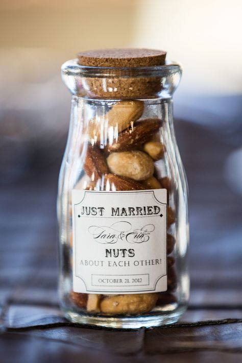 The couple sent guests home with small corked apothecary jars filled with mixed nuts. Deco Table Champetre, Summer Wedding Favors, Wedding Favor Table, Savoury Snacks, Creative Wedding Favors, Inexpensive Wedding Favors, Edible Favors, Wedding Favors And Gifts, Cheap Favors