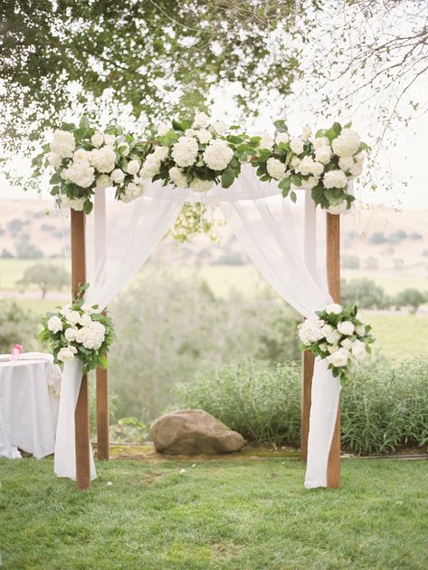 Wedding Arch With White Roses, Green And White Alter Flowers, White Rose Ceremony Flowers, Hydrangea Wedding Arbor, White And Green Wedding Arch, Altar Florals, Arbour Flowers, White Arbor, Wedding White Flowers