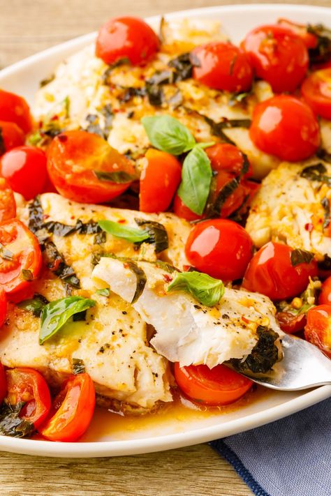 Tomato Basil Cod - Nurtured Homes Cod Tomato Recipe, Cod Dishes, Roast Fish, Cooking For One, Tomato Basil, Minced Garlic, Cherry Tomatoes, My Family, Tomatoes