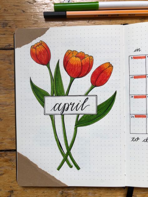 There is a bullet journal cover page for April. The bullet journal theme is tulips and flowers. Bullet journal theme for spring Daily Bullet Journal, April Bullet Journal, Copic Marker Art, Bullet Journal Paper, Bullet Journal Ideas, Day Planner Design, Bullet Journal Mood, Bullet Journal Aesthetic, Bullet Journal Notebook