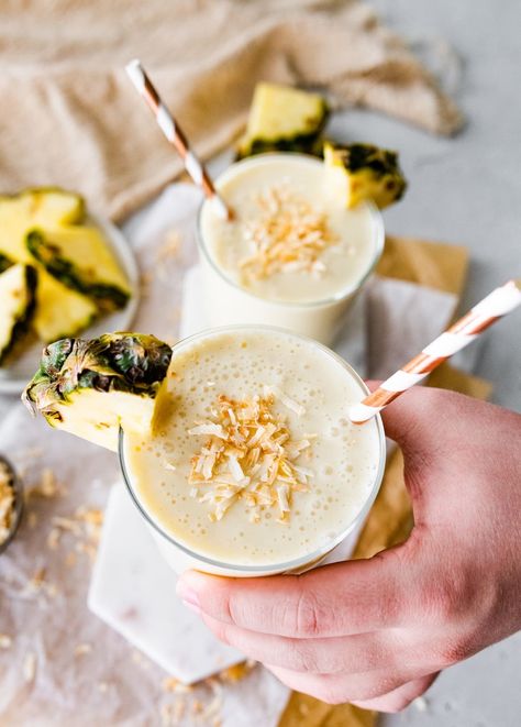 This creamy 4-ingredient pineapple smoothie combines coconut milk with yogurt, frozen pineapple and banana. One sip and you’ll feel like you’re on a tropical vacation. Vegan + dairy-free. Belly Transformation, Yogurt Frozen, Coconut Milk Yogurt, Pina Colada Smoothie, Sweet Smoothies, Ginger Smoothie, Tropical Smoothie, Vanilla Greek Yogurt, Pineapple Smoothie