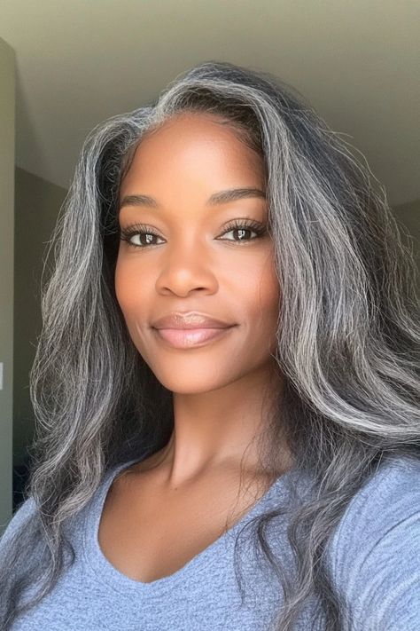 25 Examples of Transitioning to Gray Hair That'll Make You Want To Ditch the Dye - Flo's Blog Transition To Gray Hair From Black, Grey Transition Hair, Grey Natural Hair Black Women, Silver Hair On Dark Skin, Grey Hair Black Women, Natural Grey Hair Transition, Wavy Grey Hair, Going Grey Transition Tips, Gray Hair Black Women