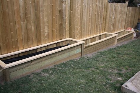 flower beds along fence | Raised Garden Beds along sloping fence Minimalist Fence, Design Fence, Vegetable Garden Beds, Raised Vegetable Gardens, Raised Patio, Patio Steps, Raised Flower Beds, Vegetable Garden Raised Beds, Sloped Garden