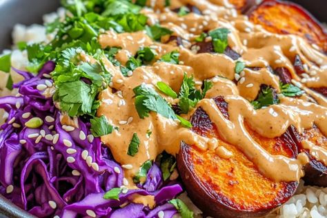 Roasted Beet and Sweet Potato Buddha Bowl with Spicy Peanut Sauce Sweet Potato Buddha Bowl, Potato Buddha Bowl, Buddha Bowl Sauce, Cabbage Rice, Spicy Peanut Sauce, Yogurt Dressing, Healthy Bowls, Spicy Peanuts, Buddha Bowls