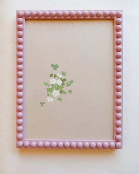 Introducing the simplicity and elegance of Brittany Smith's latest work - beautiful botanicals showcased in these custom frames! Don't wait until August 6th; message us today & add these unique pieces to your collection. 🌿 Dimensions: 13.5" h x 10" w, Framed, $465 each. 🙌 Flatten Flowers In Frame, Painted Matted Frame, Emblished Picture Frames, Pastel Picture Frames, Bobbin Frame, Pressed Flower Art Picture Frames, Neutral Nursery Art, Custom Frames, Beach Candle