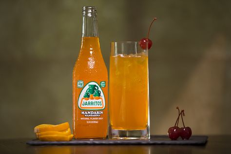 | | Jarritos - Mandarin Sunrise  Recipe: Tall glass filled with ice 1 ½ oz Smirnoff Vodka Filled with Jarritos Mandarin Add a cherry | | Jarritos Mandarin, Mandarin Soda, Orange Soda, Orange, Mandarina, Mandarin Flavor, Mandarin Drink. Mexican Beverages, Bartender Drinks, Smirnoff Vodka, Mexican Drinks, Soda Recipe, Cocktail Mixers, Fizzy Drink, Orange Soda, Cocktail Drinks Recipes