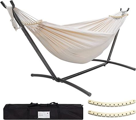 When people lie on the hammock, they feels like a page of boats quietly swaying on the lake, which is very relaxing. The hammock is precisely woven from cotton, which has a strong sense of wrapping and proper elasticity, Enjoying gravity-free relaxation. The assembly of this hammock is very simple, no tools are needed. After the bracket is assembled, the hammock can be hung on the hook of the bracket directly, and it can be easily disassembled as well. Double Hammock With Stand, Hammock With Stand, Camping Garden, Portable Hammock, People Lie, Brazilian Style, Double Hammock, Backyard Camping, Hammock Stand