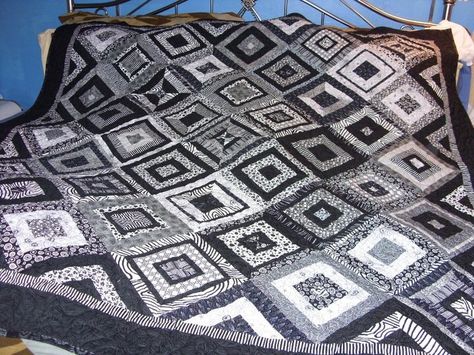 I got this Black and white Quilt Pattern from Fons & Porter. I made this Quilt for my granddaughter. Black And Grey Quilt Patterns, Quilt Black And White, Black White And Gray Quilts, Teen Sewing Projects, Black White Gray Quilts Patterns, Black And White Scrappy Quilt, Mens Crochet Beanie, Crochet Baby Mittens, Crochet Cat Bed