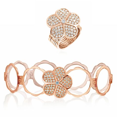 This transformable daisy ring by Gumuchian in 18ct rose gold set with pavé diamonds unfolds into a bracelet. Convertible Jewelry, Kinetic Jewelry, Jewelry Necklace Simple, Modern Gold Jewelry, Jewellery Design Sketches, Jewelry Design Drawing, Daisy Ring, Art Jewelry Contemporary, Jewellery Sketches