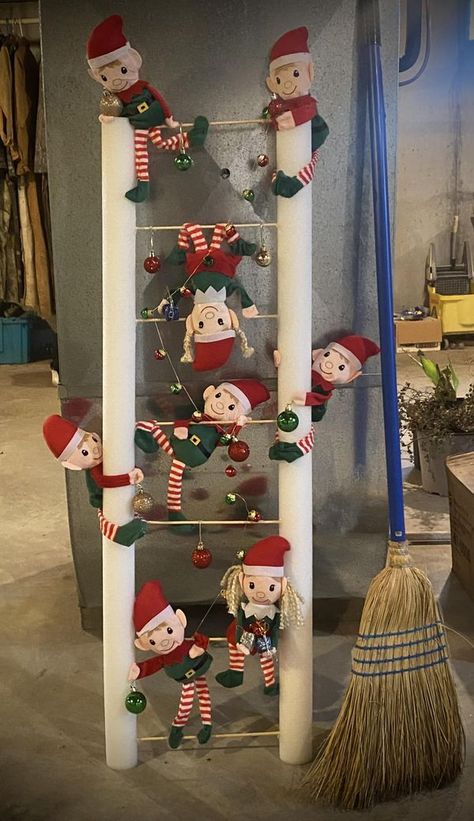 Dollar Tree Fanatics Crafts & Decor | My elf ladder made with DT elf’s Christmas Decor Ladder, Diy Elf Christmas Decorations, Elf Diy Decorations, Elf Ladder For Christmas Tree Diy, Diy Christmas Ladder, Dollar Tree Elf, Christmas Ladders Ideas, Dollar Tree Elves, Christmas Ladder