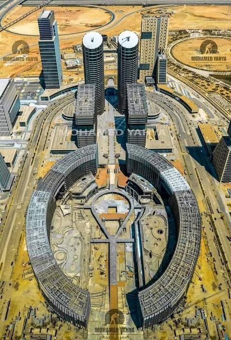 The latest exclusive photo of the life bridge key in the middle of the towers of the Central Business District (CBD) in the New Administrative Capital Central Business District, Business District, 1960s Fashion, Heaven On Earth, Places Around The World, Aerial View, تصميم داخلي, In The Middle, Egypt