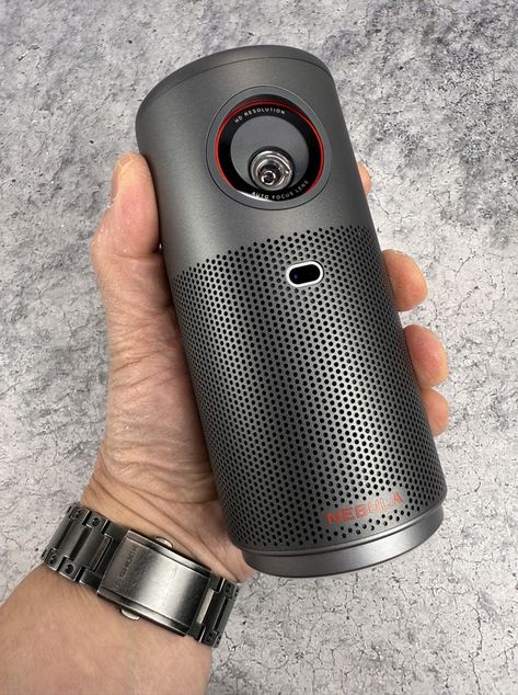 REVIEW – The last video projector I reviewed, the JMGO N1S Ultra left me quite happy. It was bright, high resolution, and even had Google smarts built in. NEBULA, makers of projectors from Anker, has released what they claim as the world’s smallest Google TV equipped projector, the Capsule Air. As Steve Martin once said, […] Small Projector, Graphics Tablets, Google Tv, Steve Martin, Video Projector, Bluetooth Audio, Edc Gear, Bluetooth Earbuds, Latest Gadgets