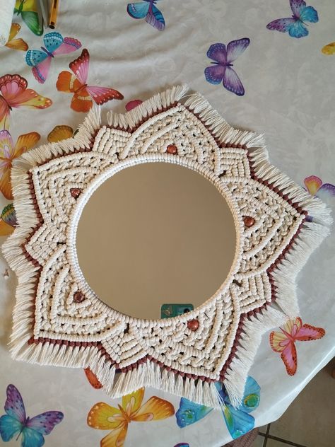 Macrame mirror. Made with my hands (and with my heart) in recycled ecru and rust cotton and wooden beads It will bring a touch of boho romanticism to your interior. Diameter of the mirror alone 20x20 cm. Total diameter with macramé edge approximately 39 cm Unique model. Only 1 in stock. Please don't let someone else take it from you... Macrame Mirrors, January Decorations, Macrame Mirror, Boho Macrame, Macrame Ideas, Macrame Decor, Macrame Tutorial, Macrame Design, Crochet Bunny