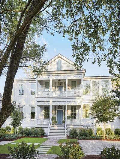 Tour the Ultimate Southern Dream House Cottage Names, Bedroom Seating Area, Blue Front Door, Riverside House, House Games, Southern Living Homes, Selling A Home, Bedroom Seating, Fernandina Beach