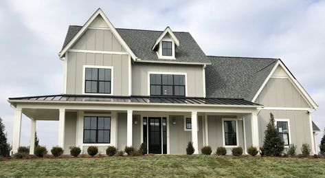 Dorian Gray Siding; Alabaster Trim; Tricorn Black front door; Black front windows; White sides and rear windows; Black metal roof; Colonial Slate shingles; House With Black Windows, Grey Siding House, Grey Farmhouse Exterior, Alabaster Trim, Siding House, Gray Siding, Farmhouse Exterior Colors, Slate Shingles, Black Metal Roof