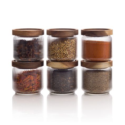 PRICES MAY VARY. INTRODUCING THE MASON & FABLE GLASS STORAGE JARS WITH WOOD LIDS - the perfect storage solution for your kitchen! With an elegant, ribbed pattern, these jars not only look great but also provide ample space to store your spices, tea, coffee, and sugar. Say goodbye to cluttered countertops and hello to organized bliss! OUR UNIQUE RIBBED OR FLUTED DESIGN GLASS JARS are the perfect decorative and versatile addition to your home! These jars are perfect for pantry organization, adding Snack Organizer, Airtight Storage, Organizing Hacks, Kitchen Jars, Spice Tea, Glass Storage Jars, Glass Canisters, Glass Food Storage, Food Jar