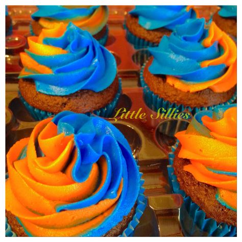 Orange and blue swirl cupcakes. Orange And Blue Birthday Party, Blipping Birthday Cake, Blue And Orange Cake Birthday, Blippi Birthday Cupcakes, Space Jam Cupcakes, Naruto Cupcakes Ideas, Blue And Orange Cupcakes, Blippi Cupcake Ideas, Blippi Cupcakes