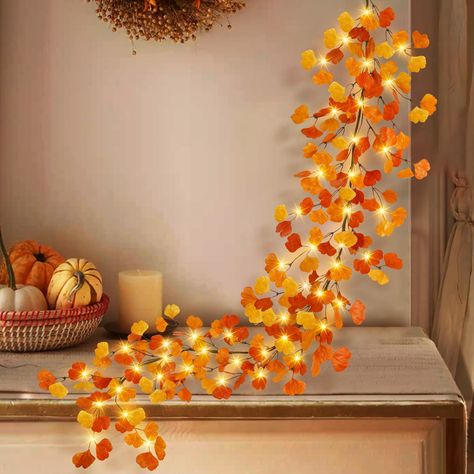 PRICES MAY VARY. Details Crafted: With a length of 6FT(72”/1.8M), crafted with realistic veining and detail on ginkgo leaves, our fall leaves garland features vibrant fall color and lifelike look, stunning and well-made 8 Lighting Modes : Press the black soft control button to switch between the lighting models. Various lighting effects create different fall atmospheres Battery operate &Timer: 3 AA battery required.The fall lighted garland can light up for 6 hours and automatically turn off for November Decor, Thanksgiving Fireplace, Fall Leaves Garland, Foliage Garland, Garland With Lights, Lighted Garland, Thanksgiving Wall Decor, Mantel Fireplace, Leaves Garland