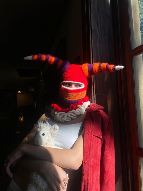 This crochet piece  is named”back to childhood” and is supposed to represent the playfulness of that time period Crochet Clown Balaclava, Horned Balaclava, Clown Balaclava, Bunny Balaclava, Balaclava Crochet, Crochet Balaclava, Crochet Mask, Crochet Monsters, Crochet Stitches Guide