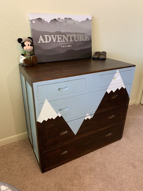 Mountain dresser for the nursery Woodland Dresser Makeover, Painted Dresser Mountains, Forest Green Mountain Nursery Boy, Woodland Dresser, Mountain Nursery Mural Diy, Boys Dinosaur Dresser, Exhibit Ideas, Green Dresser, Nursery Dresser