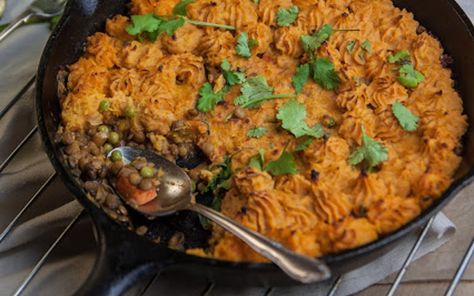 <p>This shepherdess pie is far superior to its male counterpart. The filling for this hearty meal is made from savory lentils, tender peas, and perfectly cooked carrots, then it’s topped with a creamy mixture of mashed sweet potatoes, garlic, and vegan cream cheese.</p> Savory Lentils, Shepherdess Pie, Cheesy Cauliflower Bake, Vegan Thanksgiving Recipes, Vegan Cream, Hearty Meal, Cooked Carrots, Pot Pies, Vegan Cream Cheese