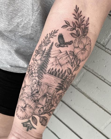 34 Magnificent Mountain Tattoo Ideas for Men & Women in 2024 Linework Forearm Tattoo, Arm Tattoos For Women Mountains, Half Sleeve Tattoos For Women Mountains, River Inspired Tattoos, Lower Forearm Tattoo Woman Half Sleeves, Mountain Travel Tattoo, Mountain And Flower Tattoo Sleeve, Landscape Tattoo Women, Mountain Floral Tattoo