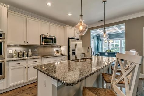 New Caledonia Granite, Granite Backsplash Kitchen, Caledonia Granite, White Ice Granite, New Home Kitchen, Granite Backsplash, Granite Island, Southern Pine, Kitchen Gallery