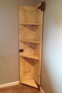 DIY Why Spend More: Another door turned corner shelf Reuse Old Doors, Corner Shelf Diy, Corner Shelves Diy, Diy Corner Cabinet, Door Corner Shelves, She Shed Ideas Interior, Tall Corner Shelf, Raw Wood Furniture, Recycled Door