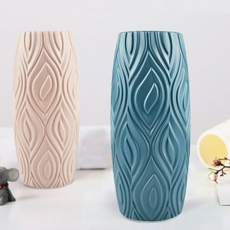 Description: The flower vase could be placed in the table, desk, bathroom vanity or in any display place to add an artistic touch. As it comes with Nordic style and delicate design. The flower vase would be a wonderful housewarming gift for your friends and relatives. As it could not only be used for table centerpiece, but also for flower arrangement. Made of plastic, it is durable and safe to use. The height of the vase is 23cm, and the width is 8cm. It is perfect for living room, bedroom, dini Origami Table, Wet Flowers, Home Flower Arrangements, Basket Flower Arrangements, Modern Flower Vase, Origami Shapes, Nordic Vase, Plastic Vase, Flower Vase Arrangements