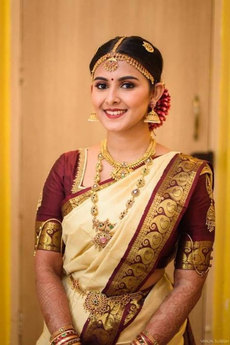 Find the best bridal makeup artists in your budget & desired city with contact information, portfolio & trusted reviews at Weddingbazaar - Trusted Wedding Services for Every Indian Wedding! #southindianwedding #southindianbride #southindianbridemakeup #southindianbridemakeuplook #southindianbridemakeover South Indian Bride Makeup, South Indian Makeup Look, Indian Makeup Look, South Indian Makeup, Kerala Wedding Saree, South Indian Wedding Saree, South Indian Bride Saree, South Indian Bridal Jewellery, Bridal Sarees South Indian