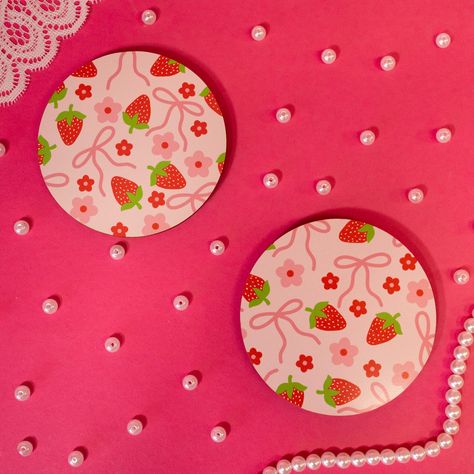 bows and strawberries on light pink coaster Coaster Inspiration, Clay Coaster, Clay Coasters, Unique Candle Scents, Funky Mirrors, Painted Coasters, Handmade Mirrors, Cute Coasters, Diy Bows