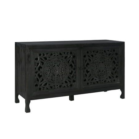 Add exceptional style and plenty of storage to your home with this beautifully crafted Powell Healey wooden cabinet. A truly versatile furniture piece, its an ideal dining room sideboard or buffet cabinet, entryway piece, or living room TV stand. Two swingout doors with carved mandala designs conceal a roomy interior perfect for storing china, large serve ware, and linens. As a final touch, a black finish is applied to the mango wood that still allows natural grain patterns to show through, furt Room Tv Stand, Cabinet Entryway, Decorative Storage Cabinets, Powell Furniture, Farmhouse Sideboard, Dining Room Sideboard, Serve Ware, Modern Rustic Decor, Wooden Cabinet