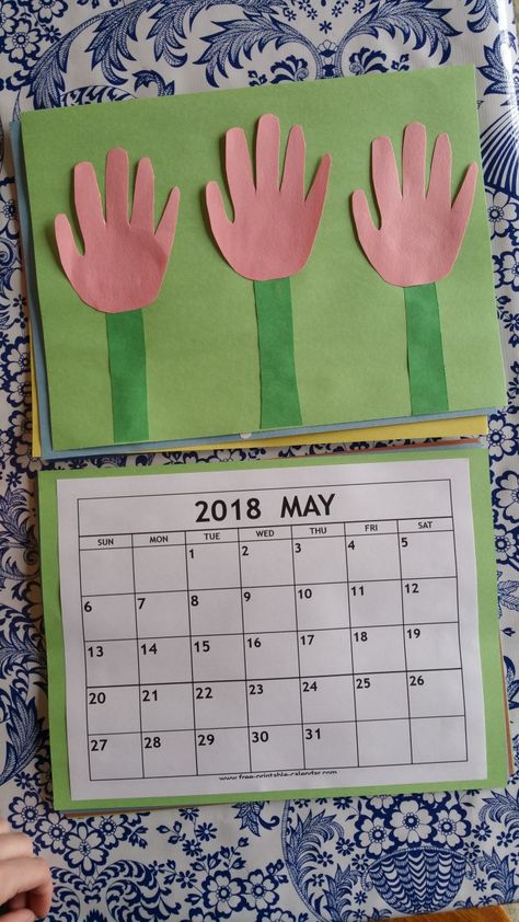 Handprint Calendar: May (tulips) Handprint Calendar, Nanny Activities, Calendar May, Footprint Crafts, Handprint Crafts, Hand Print, Nanny, Activities For Kids, Tulips