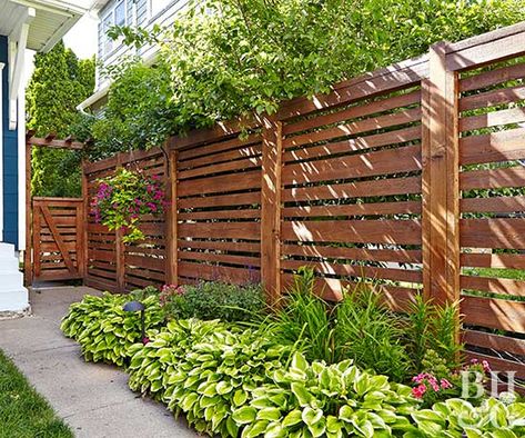 Horizontal cedar slats that are spaced a few inches apart so the fence isn't a solid mass that closes in the yard. Cheap Privacy Fence, Farmhouse Makeover, Privacy Fence Designs, Diy Fence, Building A Fence, Front Yard Fence, Privacy Fences, Urban Farmhouse, Fence Landscaping