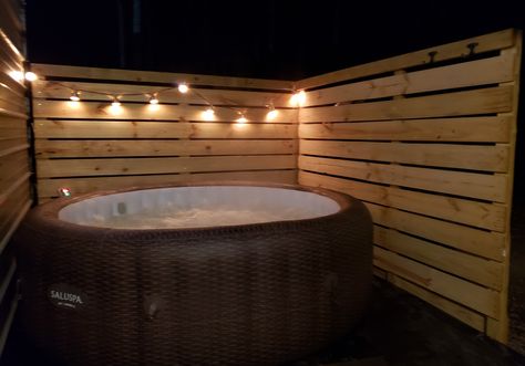 Lights, wood, hot tub, spa, privacy wall panels pallets inflatable Hot Tub Pallet Ideas, Small Porch Hot Tub Ideas, Hot Tub Garden Ideas Pergolas, Coleman Saluspa Ideas, Hot Tub Ideas Backyard Budget Diy, Pallet Hot Tub Enclosure, Pallet Hot Tub Surround, Soft Tub Surround Ideas, Inflatable Spa Ideas Backyard