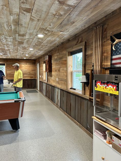 Wood And Tin Walls Rustic, Rustic Garage Interior, Shop Ceiling Ideas, Taxidermy Office, Dream Garage Man Cave, Pole Barn Bar, Rustic Man Cave Ideas, Pole Barn Man Cave, Barn Tin Wall