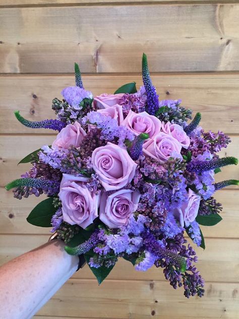 Lavender wedding bouquet; lavender roses, veronica, purple statice, lilac flower. This beautiful bouquet was created by Lisa Foster Floral Design in Knoxville, TN. www.lisafosterdesign.com Purple Hoco Flowers, Purple Prom Bouquet, Purple Prom Flowers, Flower Bouquet Purple Lavender, Hoco Bouquet Purple, Lilac Purple Flower Bouquet, Purple Flower Bouquet Prom, Bridal Bouquetr Purple, Lavender Rose Bouquet