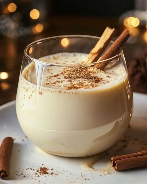 Celebrate the holidays with Coquito, Puerto Rican coconut eggnog! Creamy, rich, and spiced to perfection with cinnamon and nutmeg. Add a splash of rum for the ultimate festive drink. Get the easy recipe and serve this crowd-pleaser all season long! Eggless Eggnog, Boiled Custard, Coquito Drink, Coconut Eggnog, Custard Recipes, Festive Drinks, Winter Mornings, Festive Tables, Blended Coffee